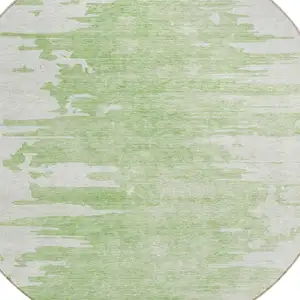 Photo of 8' Green And Mint Green Round Abstract Washable Indoor Outdoor Area Rug