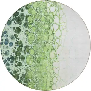 Photo of 8' Green And Mint Green Round Abstract Washable Indoor Outdoor Area Rug