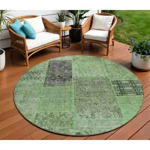 Photo of 8' Green And Olive Green Round Patchwork Washable Indoor Outdoor Area Rug