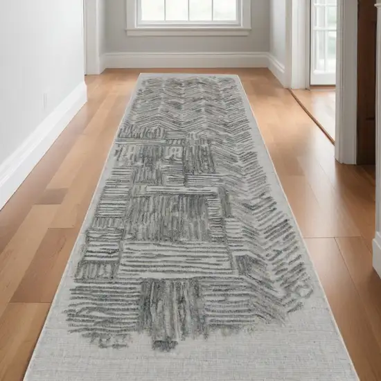 10' Blue and Ivory Abstract Hand Woven Runner Rug Photo 1