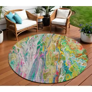 Photo of 8' Green Gold And White Round Abstract Washable Indoor Outdoor Area Rug