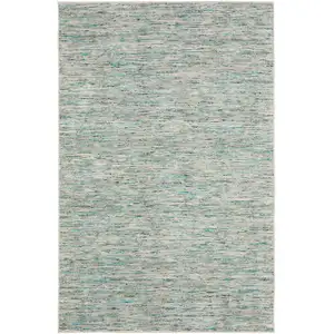 Photo of 12' Green and Ivory Wool Hand Loomed Runner Rug