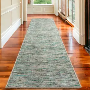 Photo of 16' Green and Ivory Wool Hand Loomed Runner Rug