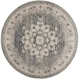 Photo of 8' Grey And Ivory Round Oriental Power Loom Non Skid Area Rug