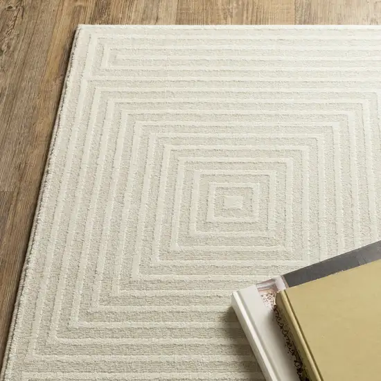 8' Ivory And Beige Geometric Runner Rug Photo 8