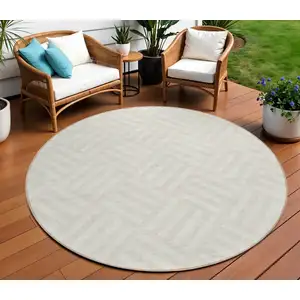 Photo of 8' Ivory And Beige Round Geometric Washable Indoor Outdoor Area Rug