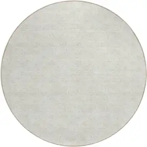 Photo of 8' Ivory And Beige Round Geometric Washable Indoor Outdoor Area Rug