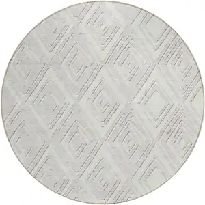 Photo of 8' Ivory And Beige Round Geometric Washable Indoor Outdoor Area Rug