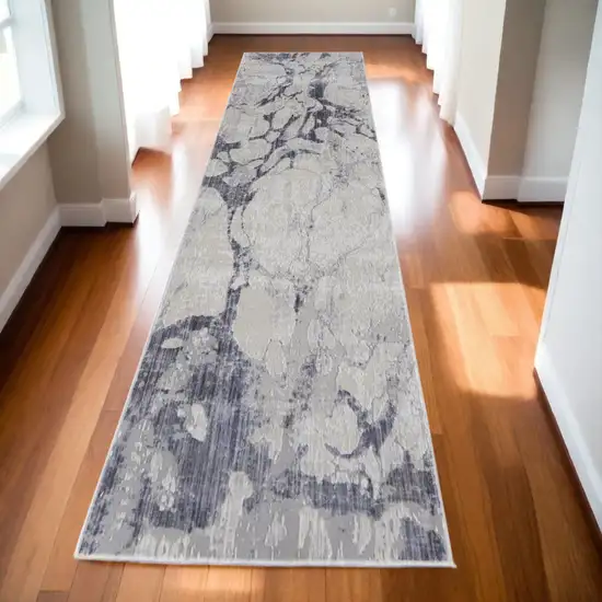 10' Ivory and Blue Abstract Power Loom Distressed Non Skid Runner Rug Photo 1