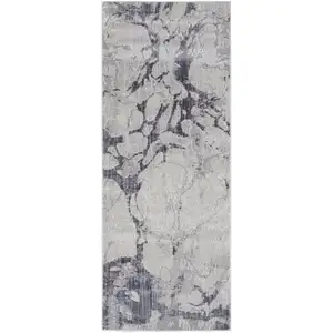 Photo of 10' Ivory And Blue Abstract Power Loom Distressed Runner Rug