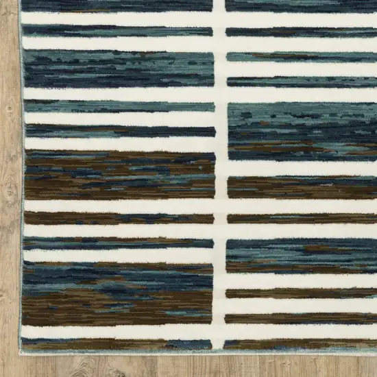 8' Ivory And Blue Geometric Runner Rug Photo 4