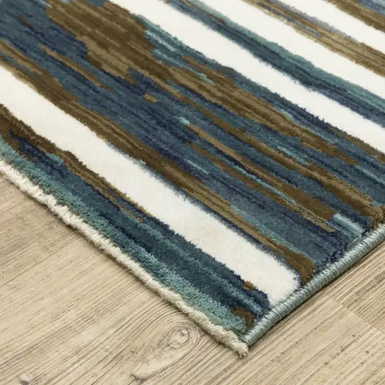 8' Ivory And Blue Geometric Runner Rug Photo 9