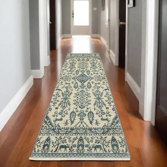 8' Ivory And Blue Oriental Runner Rug With Fringe Photo 1