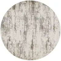 Photo of 8' Ivory And Brown Round Abstract Area Rug