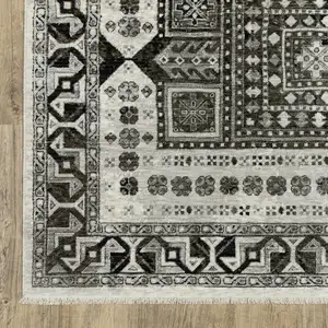 Photo of 8' Ivory And Charcoal Oriental Runner Rug With Fringe