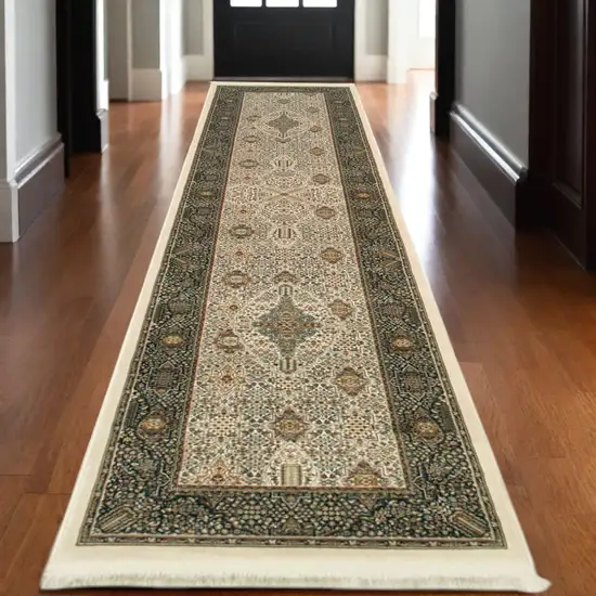 10' Ivory And Dark Blue Medallion Runner Rug With Fringe Photo 1