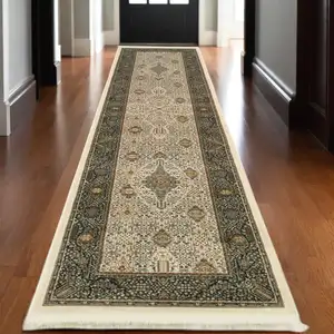 Photo of 10' Ivory And Dark Blue Medallion Runner Rug With Fringe