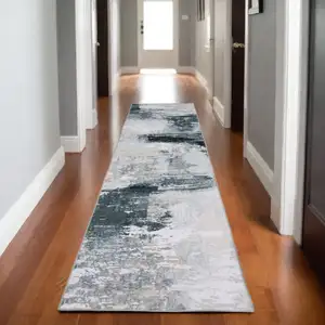 Photo of 8' Ivory And Gray Abstract Distressed Runner Rug