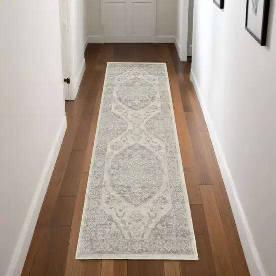 7' Ivory And Gray Floral Medallion Distressed Runner Rug Photo 1