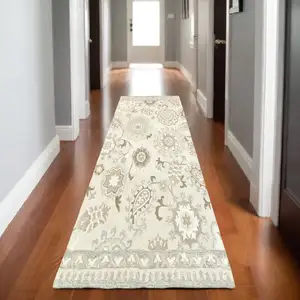 Photo of 8' Ivory And Gray Wool Floral Hand Tufted Runner Rug