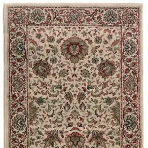 Photo of 9' Ivory And Green Oriental Runner Rug