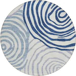 Photo of 8' Ivory And Navy Blue Round Abstract Washable Indoor Outdoor Area Rug