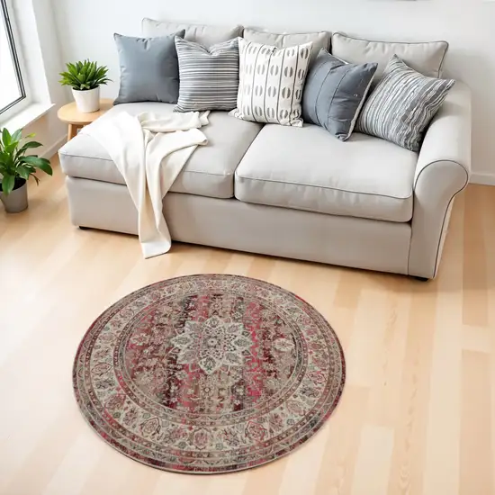 4' Ivory And Red Floral Distressed Round Rug Photo 1