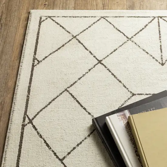 8' Ivory And Taupe Geometric Runner Rug Photo 8