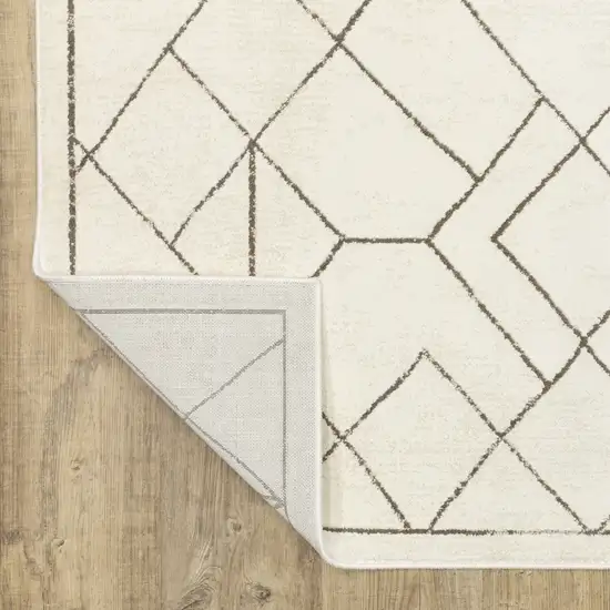 8' Ivory And Taupe Geometric Runner Rug Photo 9