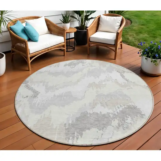 8' Ivory Beige And Cream Round Abstract Washable Indoor Outdoor Area Rug Photo 1