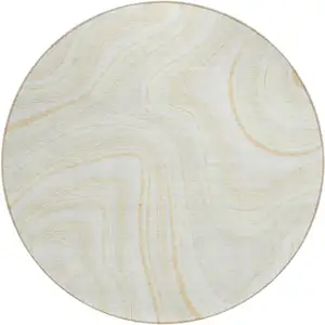 Photo of 8' Ivory Beige And Tan Round Abstract Washable Indoor Outdoor Area Rug