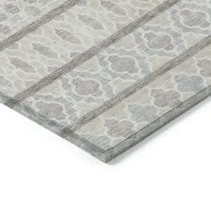 Photo of 8' Ivory Beige And Taupe Round Quatrefoil Washable Indoor Outdoor Area Rug