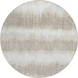 Photo of 8' Ivory Beige And Taupe Round Striped Washable Indoor Outdoor Area Rug