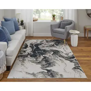 Photo of 8' Ivory Black and Taupe Abstract Power Loom Runner Rug