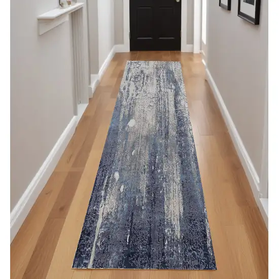 8' Ivory Blue And Black Abstract Power Loom Distressed Runner Rug Photo 1