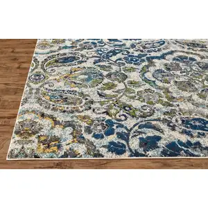 Photo of 10' Ivory Blue And Green Floral Stain Resistant Runner Rug