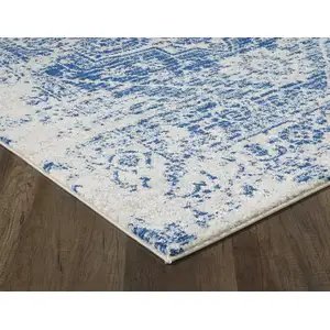 Photo of 7' Ivory Blue Machine Woven Distressed Medallion Indoor Runner Rug