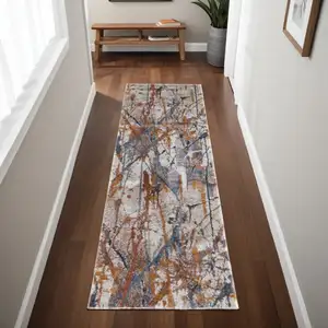 Photo of 8' Ivory Blue and Brown Abstract Power Loom Runner Rug