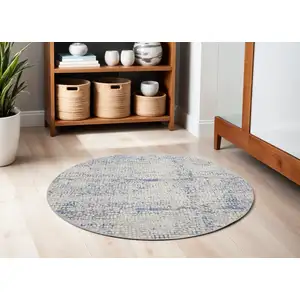 Photo of 8' Ivory Blue and Gray Abstract Round Rug