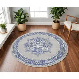 Photo of 8' Ivory Blue and Gray Floral Round Rug