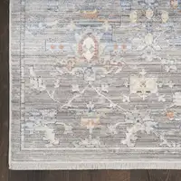 Photo of 8' Ivory Blue and Gray Oriental Power Loom Distressed Runner Rug With Fringe