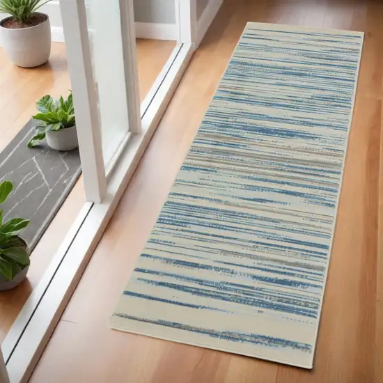 6' Ivory Blue and Gray Striped Non Skid Runner Rug Photo 1