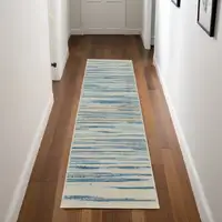 Photo of 7' Ivory Blue and Gray Striped Runner Rug