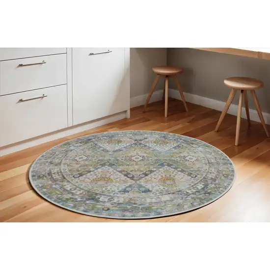 6' Ivory Blue and Green Floral Distressed Non Skid Round Rug Photo 1