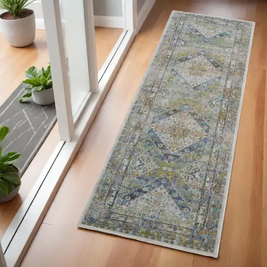 6' Ivory Blue and Green Floral Distressed Non Skid Runner Rug Photo 1