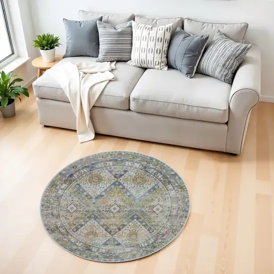 4' Ivory Blue and Green Floral Medallion Distressed Non Skid Round Rug Photo 1