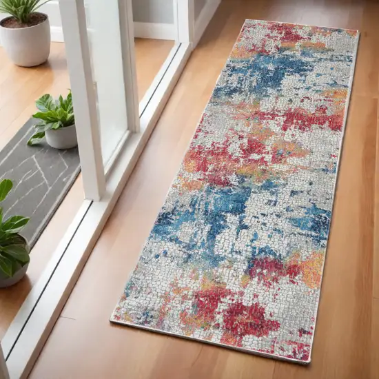 6' Ivory Blue and Orange Abstract Distressed Non Skid Runner Rug Photo 1