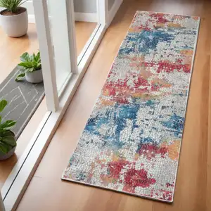 Photo of 6' Ivory Blue and Orange Abstract Distressed Non Skid Runner Rug