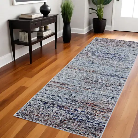 8' Ivory Blue and Orange Abstract Power Loom Runner Rug Photo 1