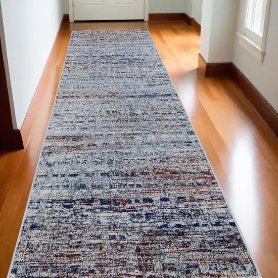 10' Ivory Blue and Orange Abstract Power Loom Runner Rug Photo 1